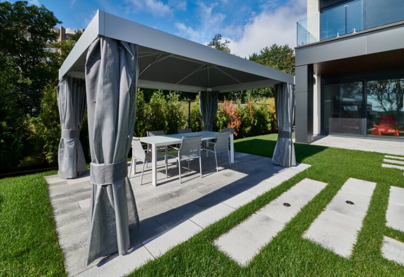 Modern Unilock backyard paving and garden terrace
